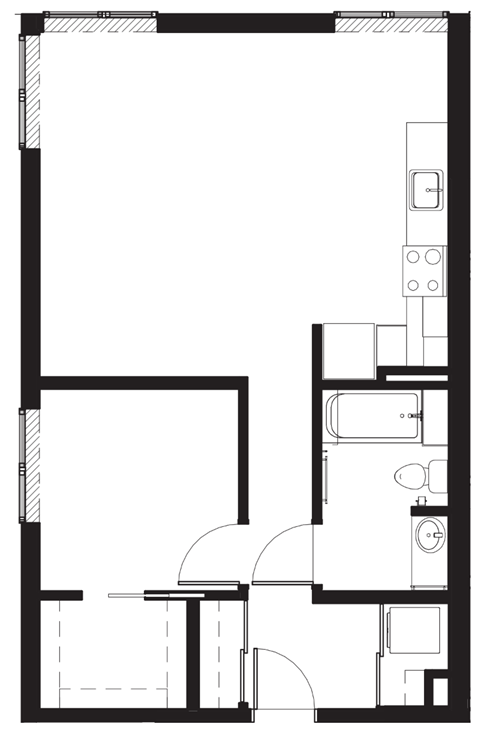 a small floor plan of a room with a bedroom and a kitchen and a bathroom